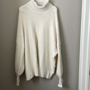 Offline turtleneck sweater in cream. New